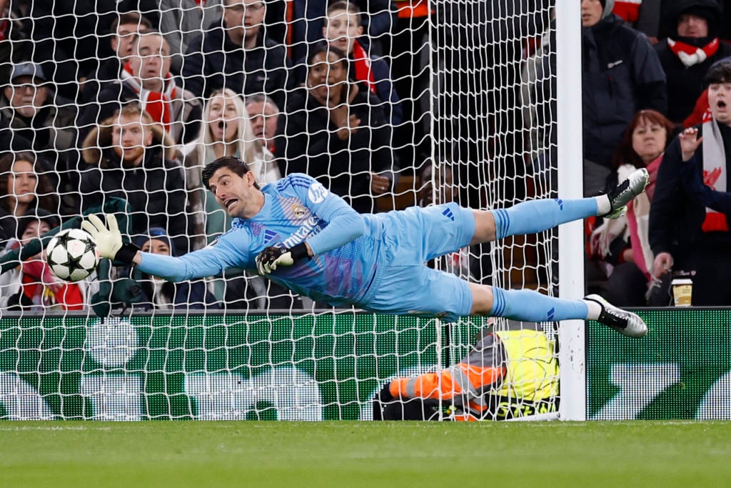 Courtois makes a save.