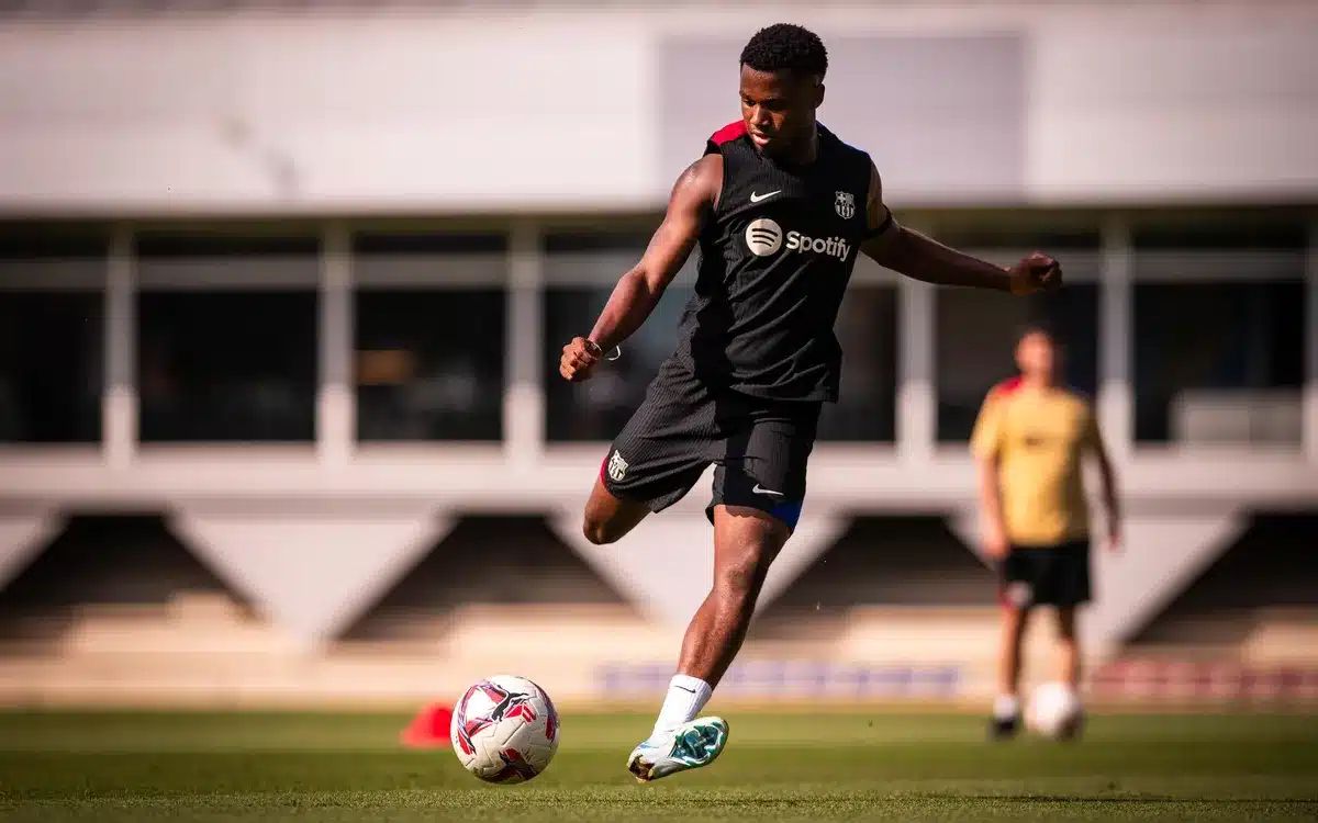 Ansu Fati strikes the ball in training.