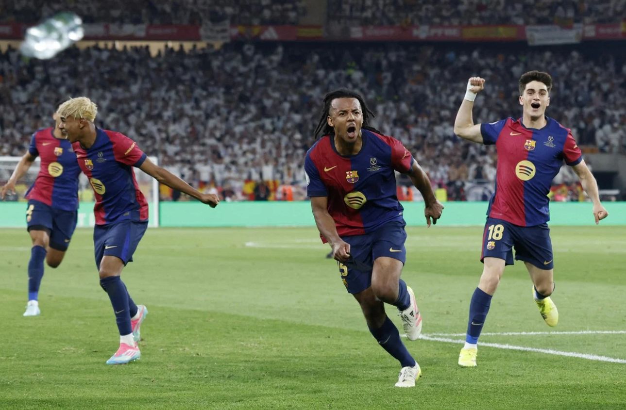 Kounde celebrates the Copa del Rey winner